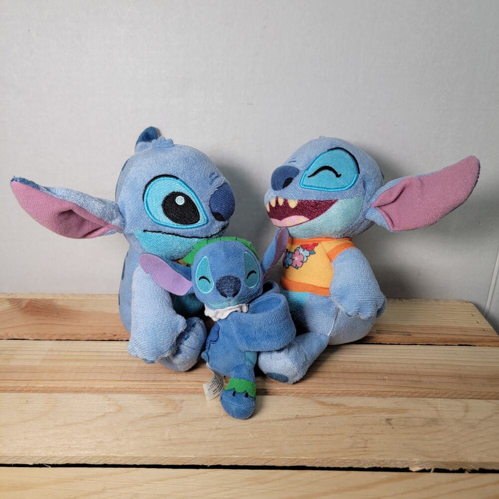 Set of 3 Stitch Toys: 2 Plush w/ Lei & 1 Slap Bracelet